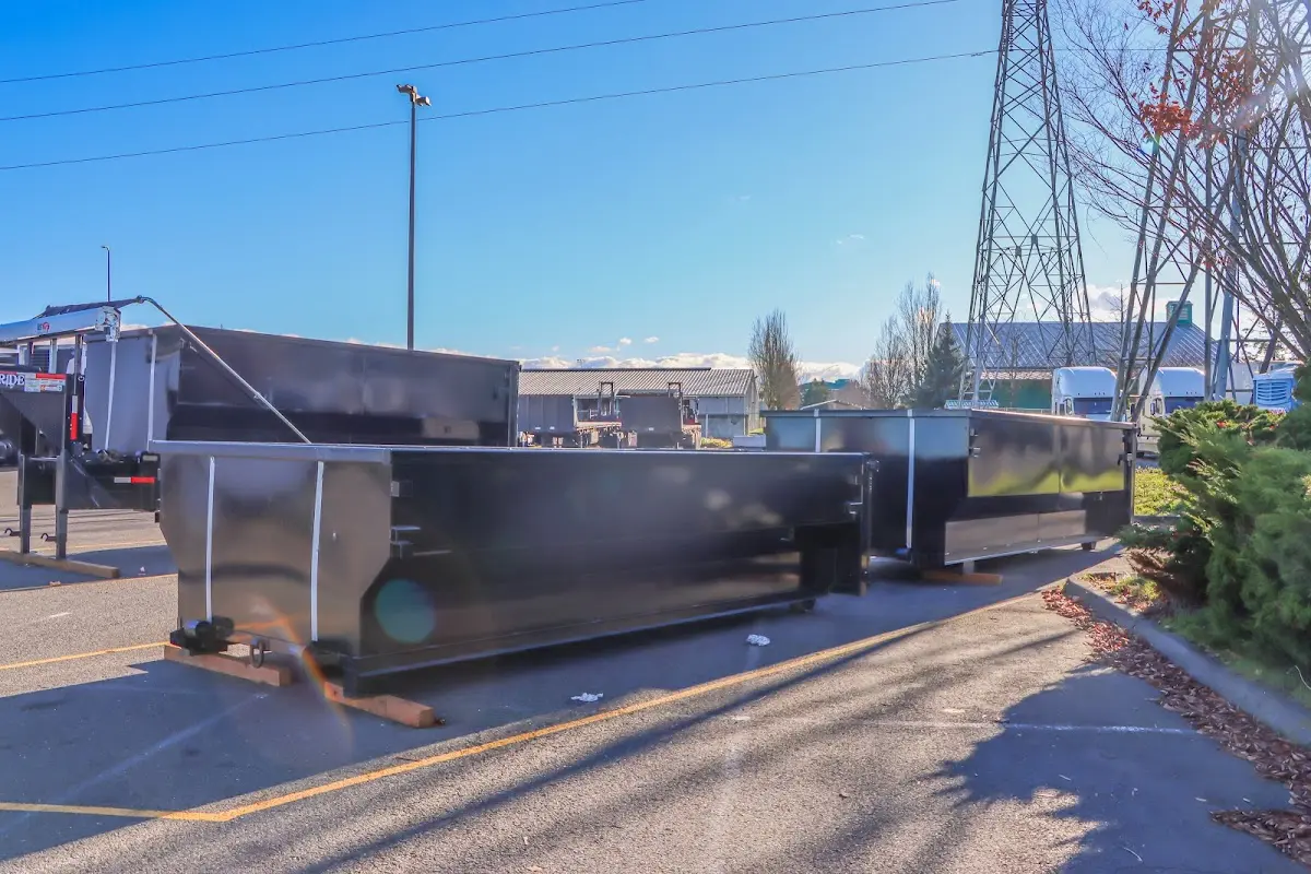Roll-off dumpster ready for waste disposal at job site for Commercial Dumpster Rental in Canton